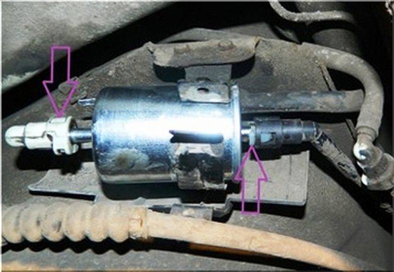 Где находится топливный фильтр на шевроле эванда